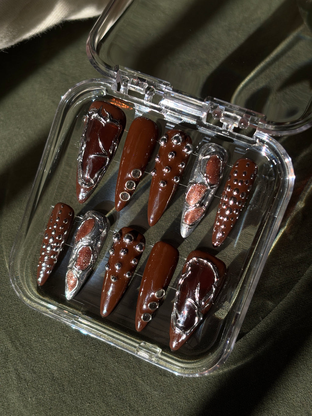 Dark brown and silver nails